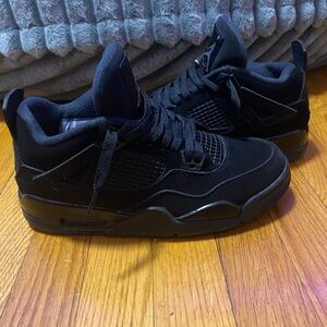 Black Cat Jordan 4s